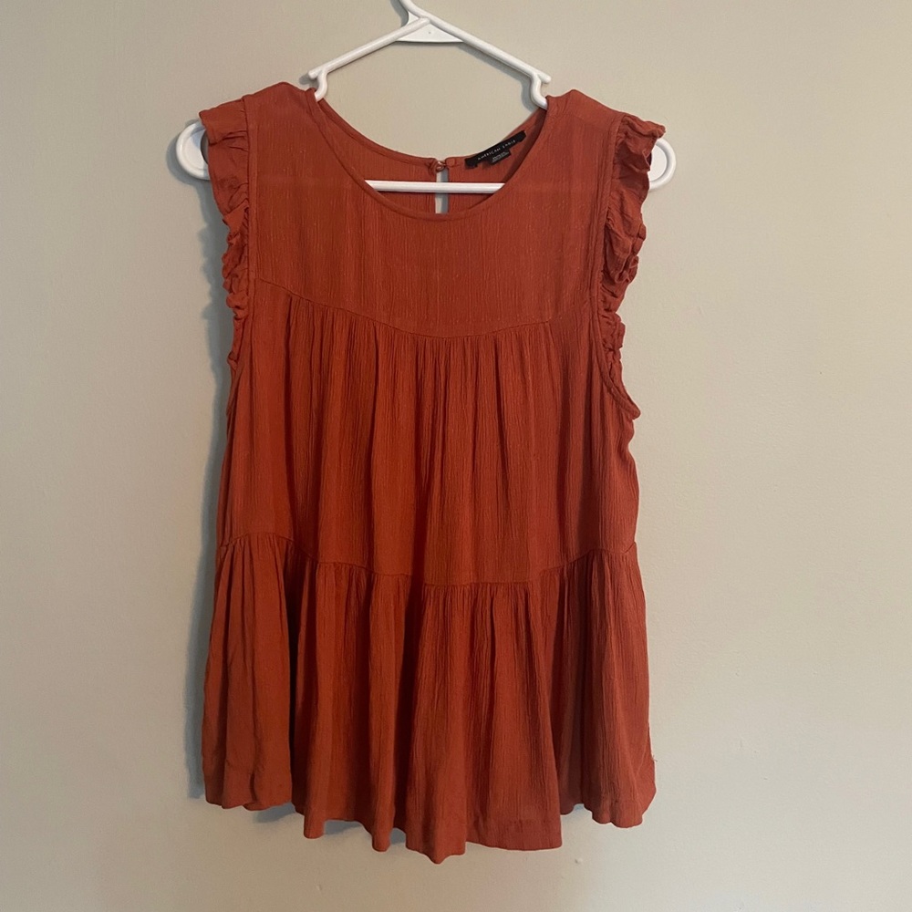 American Eagle medium blouse in a faded orange color